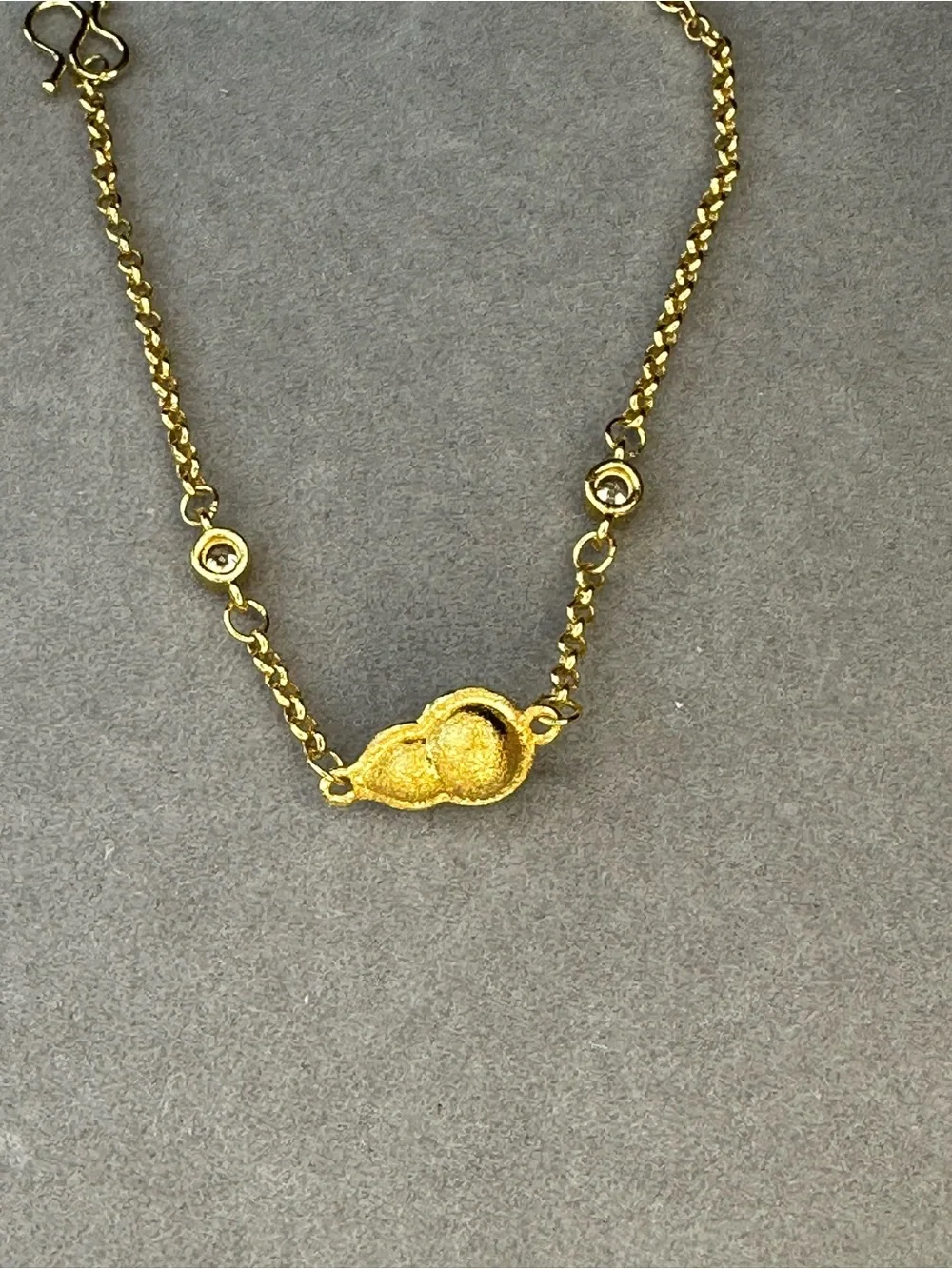 Gold Tone Women’s Necklace with Textured Shell Accent